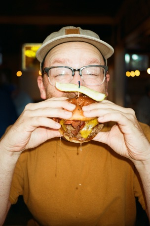 Faraday Park Man with Burger