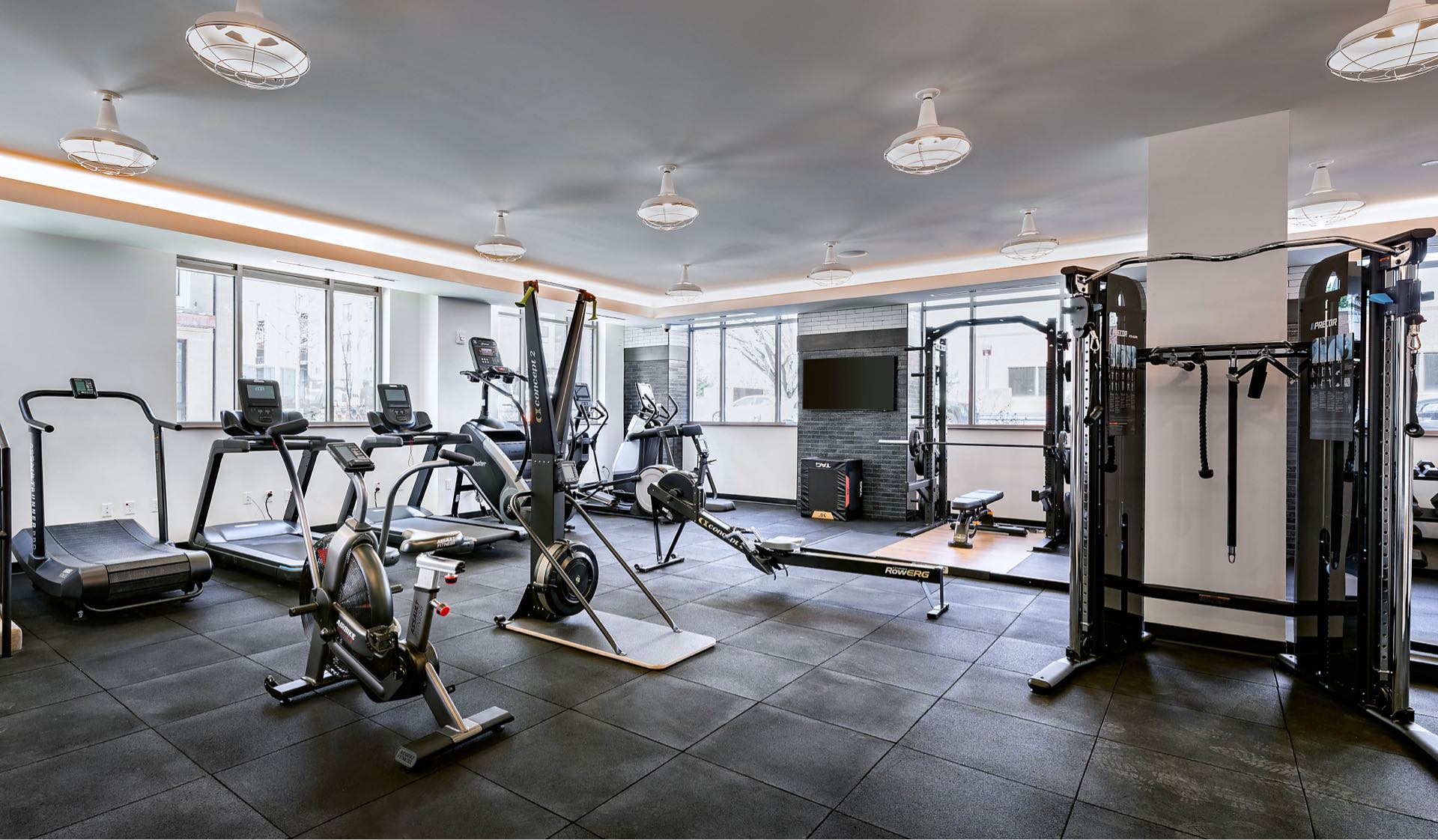 Faraday Park East fitness center featuring a variety of workout machines